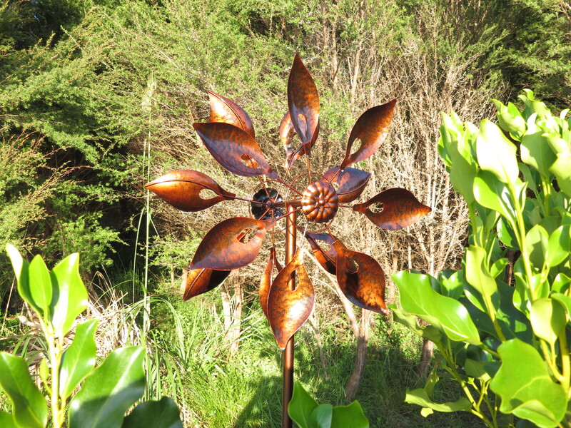 copper flame wind sculpture